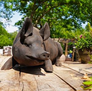 Laying Sow pig Statue